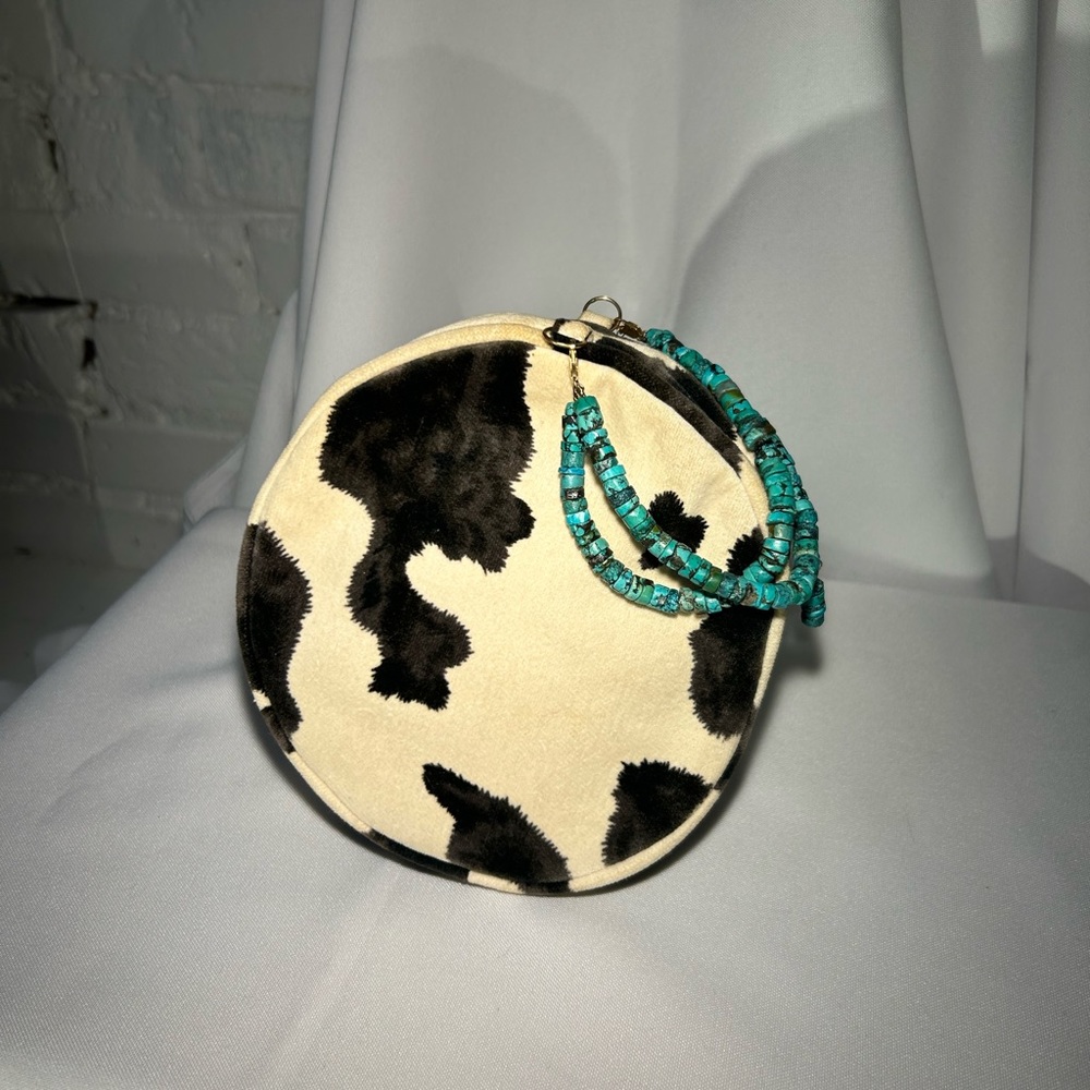 cow print and turquoise purse